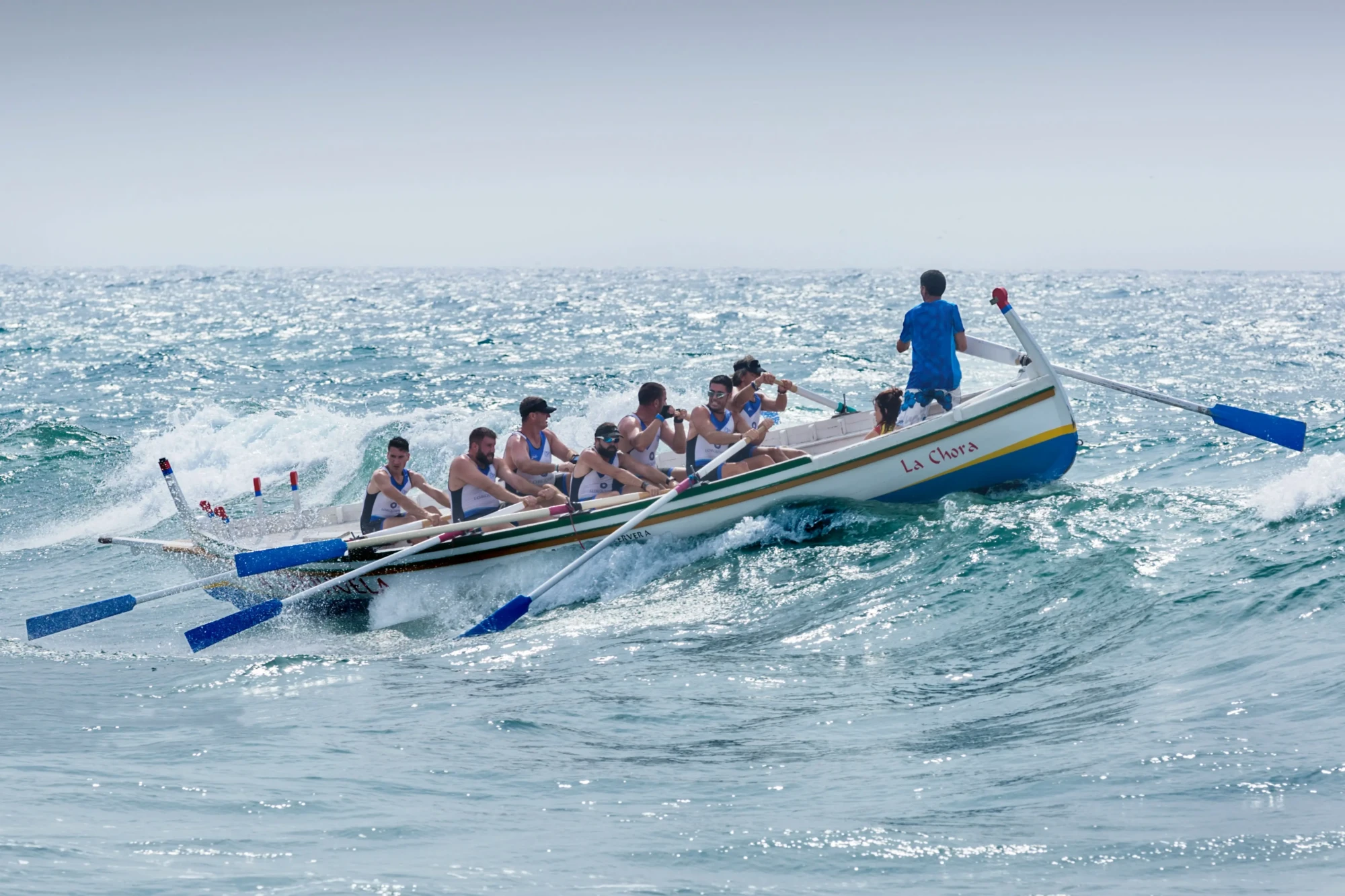 equipe en bateau par Quino-Al-unsplash